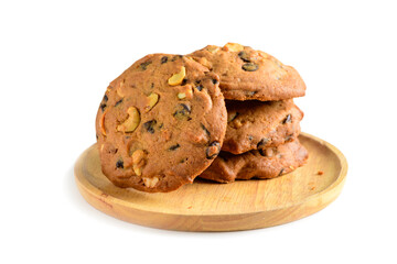 Homemade pastry cookies on wood dish isolated on white background,