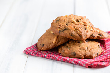 Homemade pastry cookies on white wood background,