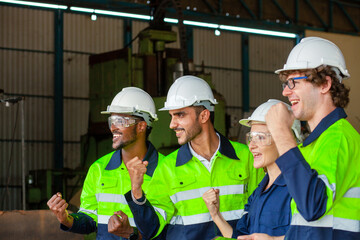 A group of engineers, skilled hands and workers from various nationalities. Workshop and maintenance in industrial plants. Professional mechanical engineering team