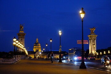 Fototapeta na wymiar A nice street lamp on the bridge Alexandre III. Paris, France. May 2022.