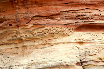 stone background with a pattern similar to Arabic script