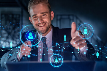 Portrait of handsome businessman in formal suit looking for employees and thinking how to hire new...