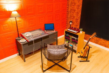 music studio corner in living room. casual home studio in asian contemporary style