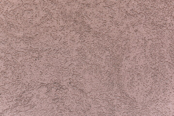 Dirty pink concrete background.