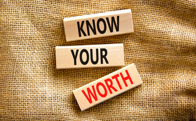 Know your worth symbol. Concept words Know your worth on wooden blocks. Beautiful canvas table canvas background. Business and know your worth concept. Copy space.