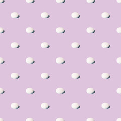 White pills on a lilac  background. Seamless pattern for the background. Medical pharmacy flat lay design for presentation packaging, website, flyer, cover business cards.