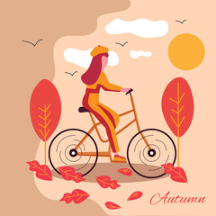 Woman riding bicycle in a park.