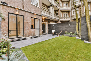 Backyard of house with lawn