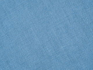 Light blue woven surface closeup. Linen textile texture. Fabric background. Textured braided backdrop or wallpaper. Macro