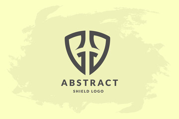 Initial letter g g in shape of shield. Handwriting vector logo design illustration image