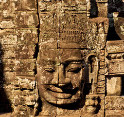 Budha's smile sculpture in Angkor Wat Cambodia