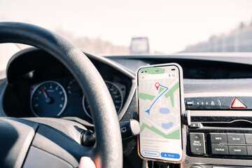Gps navigation map system. Global positioning system on smartphone screen in auto car on travel...