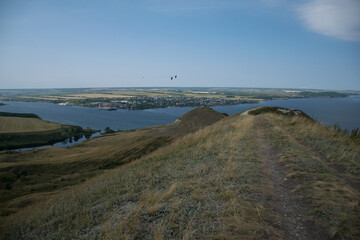 Summer landscape with a view of the river with steep banks. Volga River, Russia, Ulyanovsk