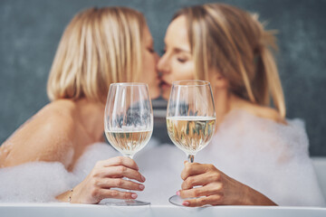Two girls or couple in bathroom having fun