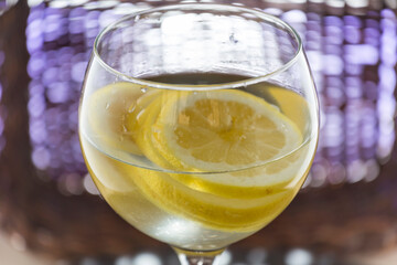 refreshing drink with lemon water, hot summer