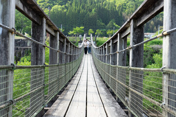 Obraz premium wooden bridge over the river