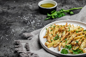 Healthy Homemade food, roasted parsnips side dish on plate. Delicious vegetarian breakfast or...