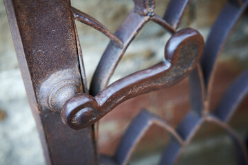 Massive metal iron door handle, close-up