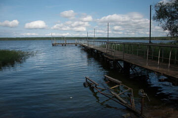 Fototapeta premium an old metal pier with railings on the Volga river. Ulyanovsk