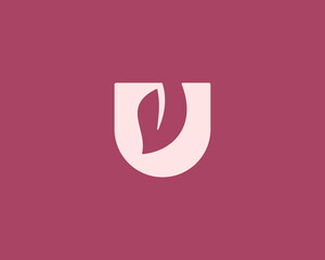Abstract letter U with leaf inside icon logo vector design template. Creative bio, growth, environment concept logotype emblem sign mark. © iamguru