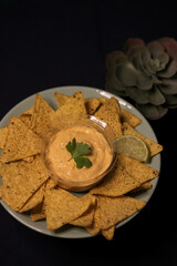 Mexican food, guacamole, chilli, nachos, cheddar, sour cream, tacos, lettuce, avocado, tomato salad, burritos wrap tortilla lime salsa coriander catus capsicum chili pepper onion takeaway delivery box