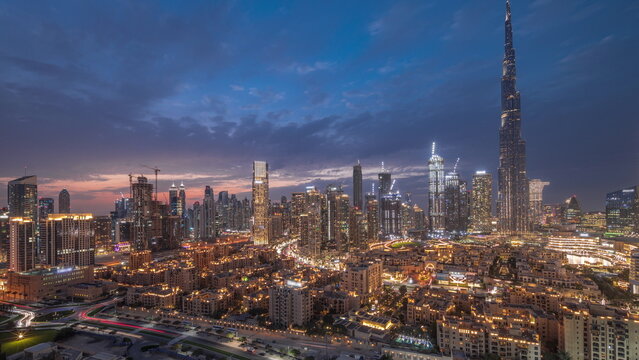 Dubai Downtown day to night transition timelapse with tallest skyscraper and other towers © neiezhmakov