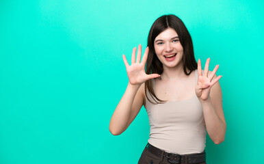 Fototapeta premium Young Russian woman isolated on green background counting nine with fingers