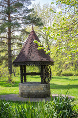 Old water well in the forest