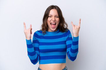 Young caucasian woman isolated on white background making horn gesture