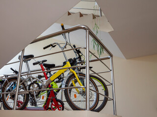 Inside the bicycle garage storage place office or an apartment block building or multi-family house