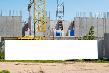 Advertising banner mock-up on the fence of construction site © diesirae