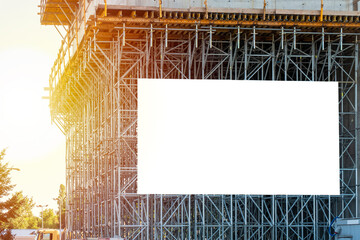 Blank white billboard for advertisement on the construction site © diesirae