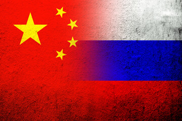 National flag of Russian Federation with Peoples Republic of China National flag. Grunge background