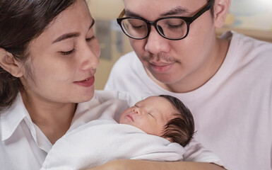 Portrait of Asian parents newborn baby day, Closeup portrait of asian young couple father mother...