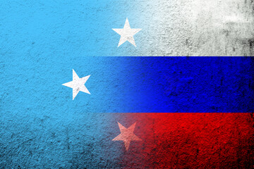 National flag of Russian Federation with States of Micronesia national flag. Grunge background