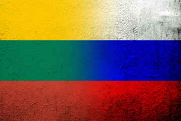 National flag of Russian Federation with The Republic of Lithuania National flag. Grunge background