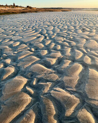 Patterns in the sand at low tide 