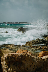 waves crashing on rocks