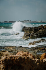 waves crashing on rocks