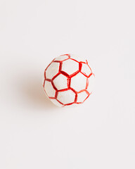 red and white soccer ball on white background. world championship, european league, game.