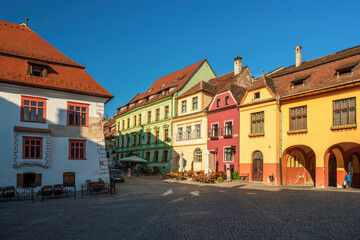 Colorful houses at Citadel Square in historic centre of Sighisoara town, Transylvania region,...