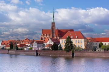 Poland, Wroclaw, April 16, 2022. View to Odra River and  Tumski Island. Old Town of Wroclaw in Spring 2022