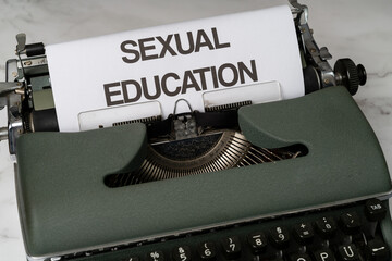 Sexual education written on a paper in a type writer