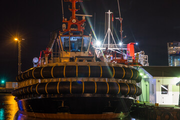 Tugboat at the pier in port of Reykjavik