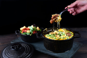 plate with meat filet bacon salad, healthy food, tomato lettuce hearts of palm mushrooms mustard sauce