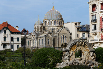 Fototapeta na wymiar Russian orthodox church ,built in 1892 in Biarritz, France. Historical monument in the foreground. The road leading to the church.
