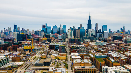 Fototapeta na wymiar aerial drone shot of Chicago urban city area. the aerial photography of the city is beautiful with skyscrapers and clouds 