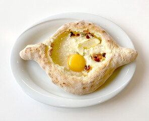 Georgian cuisine: Adjarian khachapuri  with egg 
