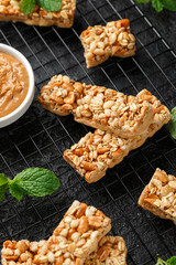 Roasted Peanuts butter Cereal Bars with nuts, oat and honey. Healthy Protein snack