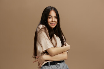 portrait woman attractive look charmin in a t-shirt beige background